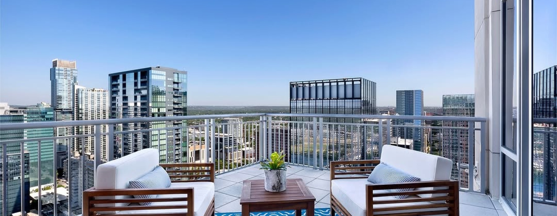 a rooftop overlooking buildings