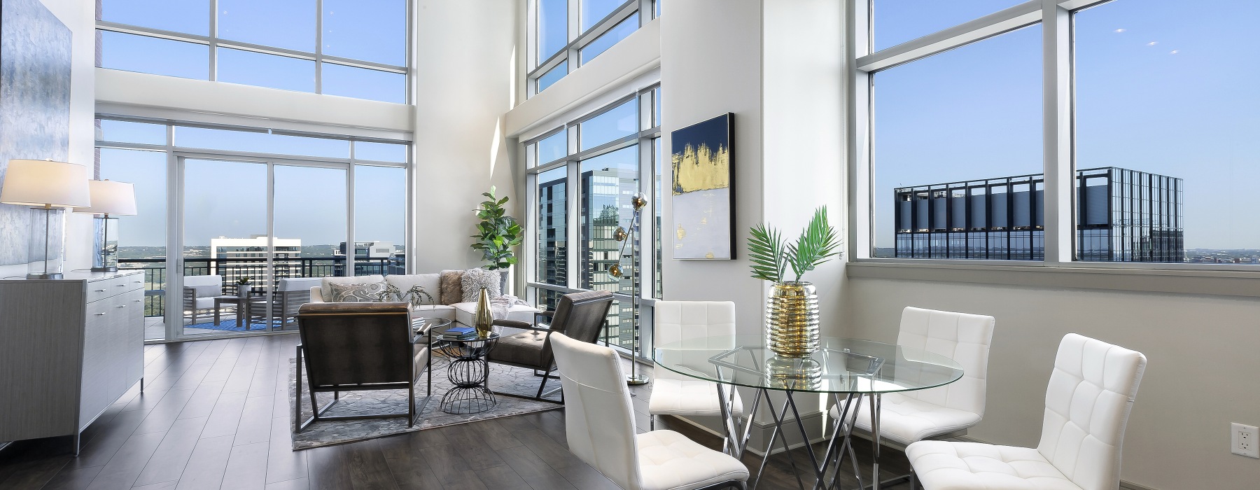 High-rise view from modern living room at Ashton Austin's penthouse apartments in Austin	