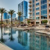 Resort-style swimming pool with sundeck at Ashton Austin apartments for rent in Austin